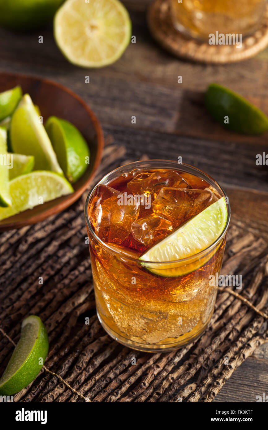 Dark and Stormy Rum Cocktail with Lime and Ginger Beer Stock Photo