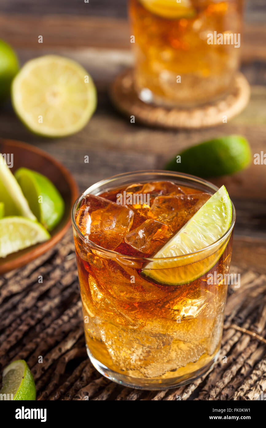 Dark and Stormy Rum Cocktail with Lime and Ginger Beer Stock Photo