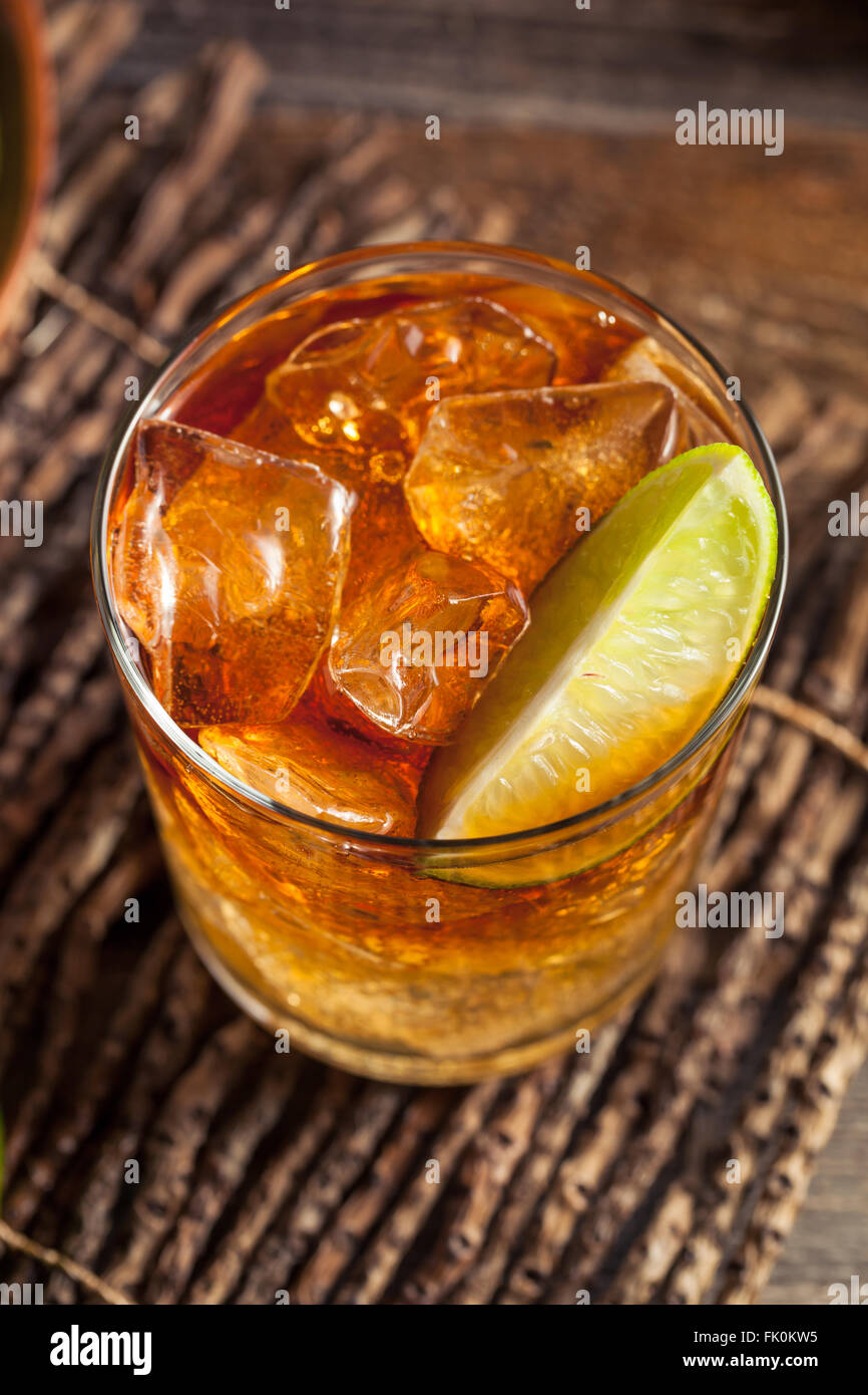 Dark and Stormy Rum Cocktail with Lime and Ginger Beer Stock Photo Alamy
