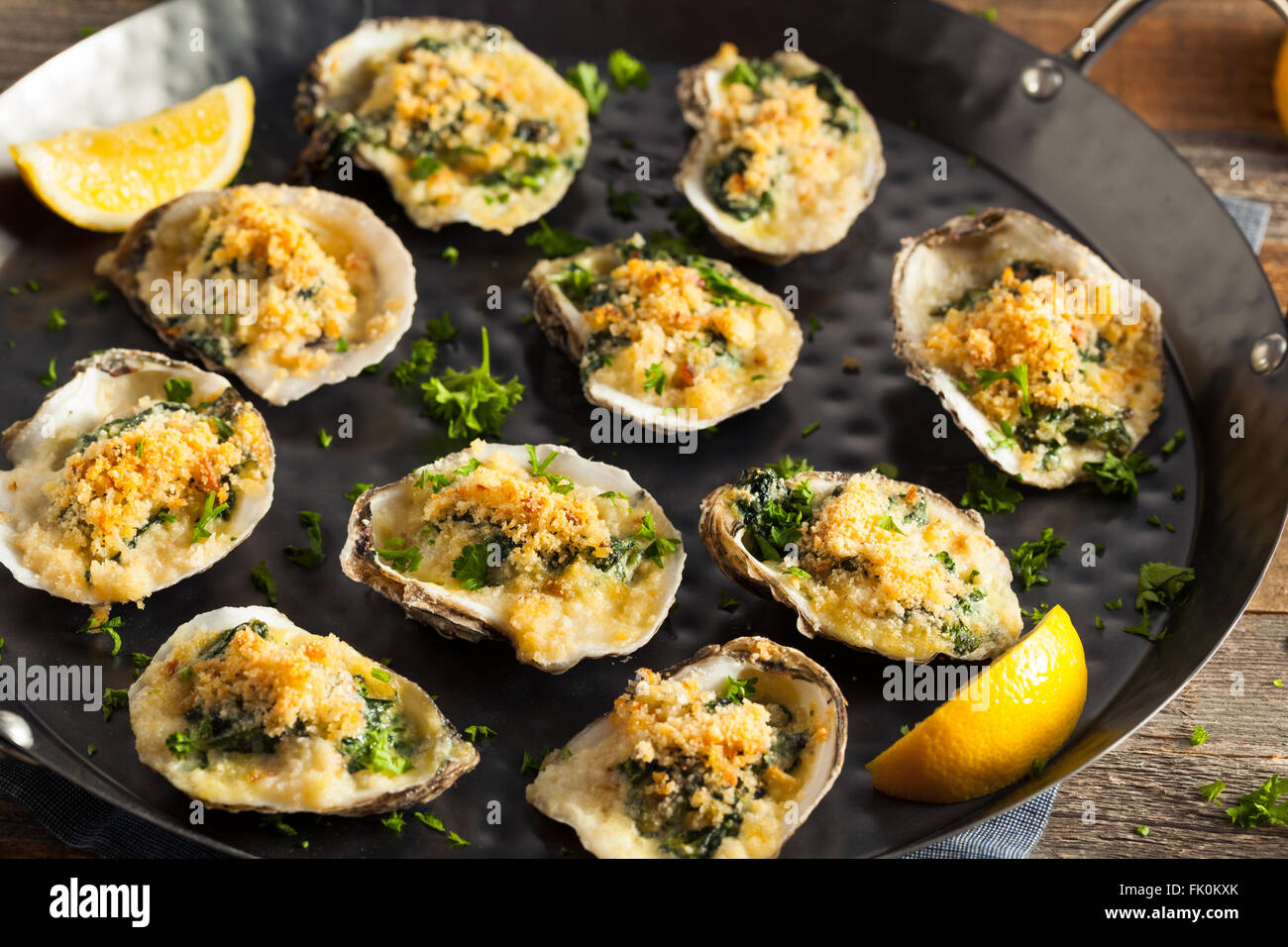 Homemade Creamy Oysters Rockefeller with Cheese and Spinach Stock Photo