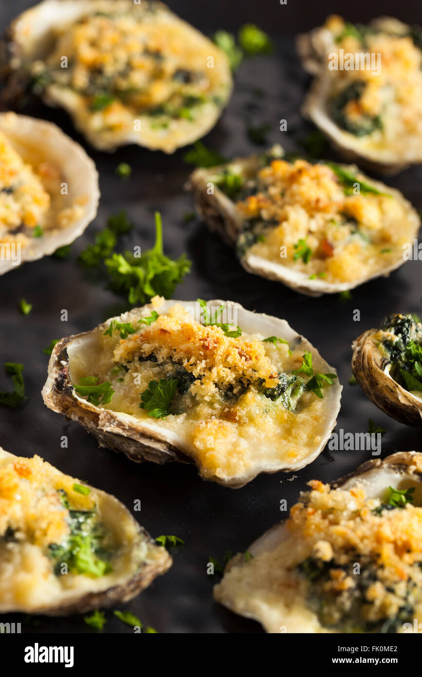 Homemade Creamy Oysters Rockefeller with Cheese and Spinach Stock Photo