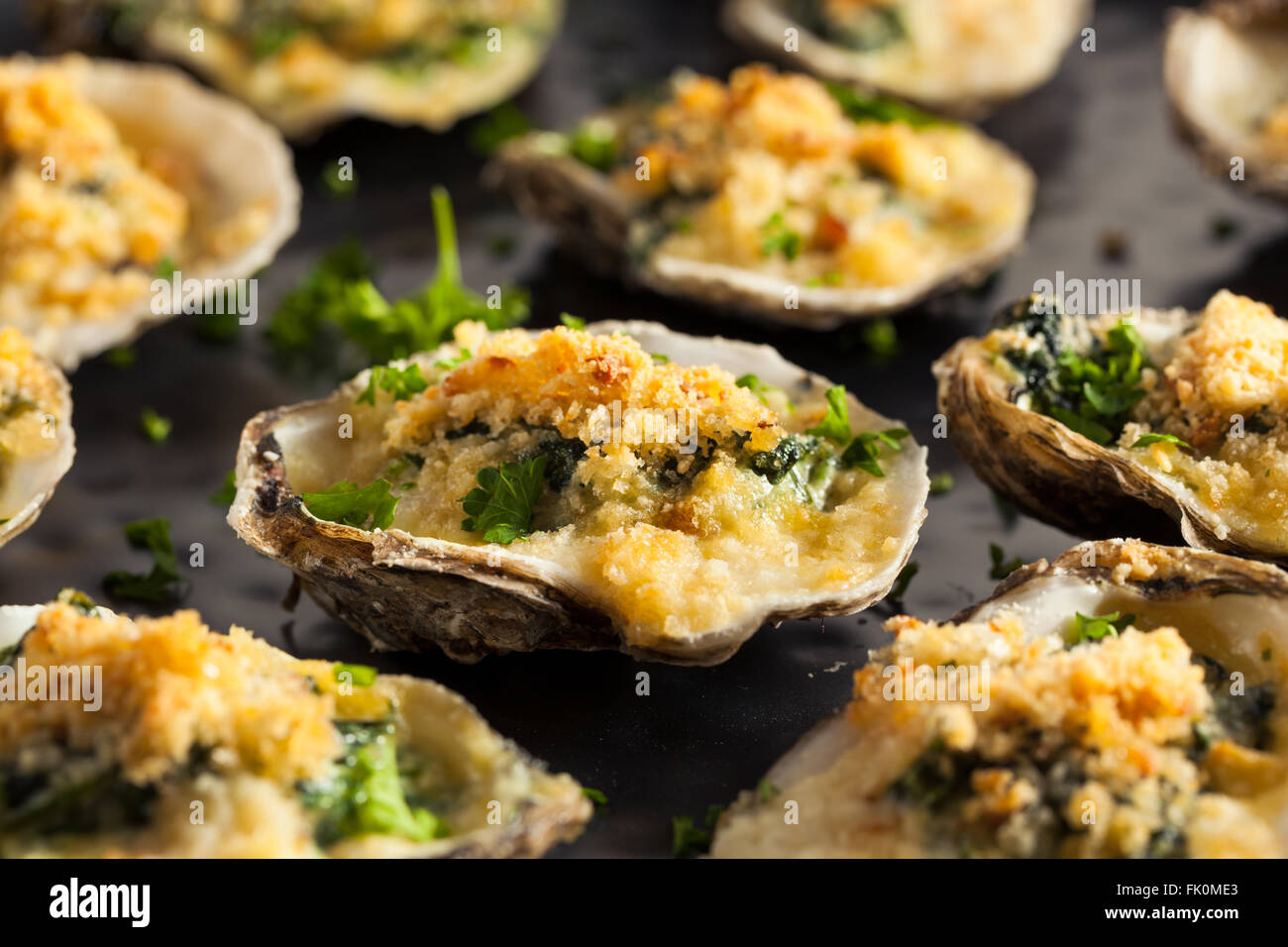 Homemade Creamy Oysters Rockefeller with Cheese and Spinach Stock Photo
