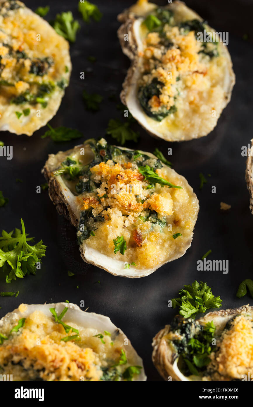 Homemade Creamy Oysters Rockefeller with Cheese and Spinach Stock Photo