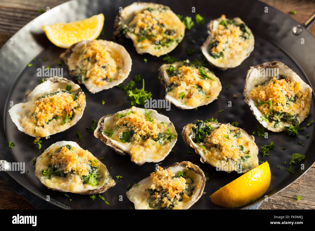 Homemade Creamy Oysters Rockefeller with Cheese and Spinach Stock Photo