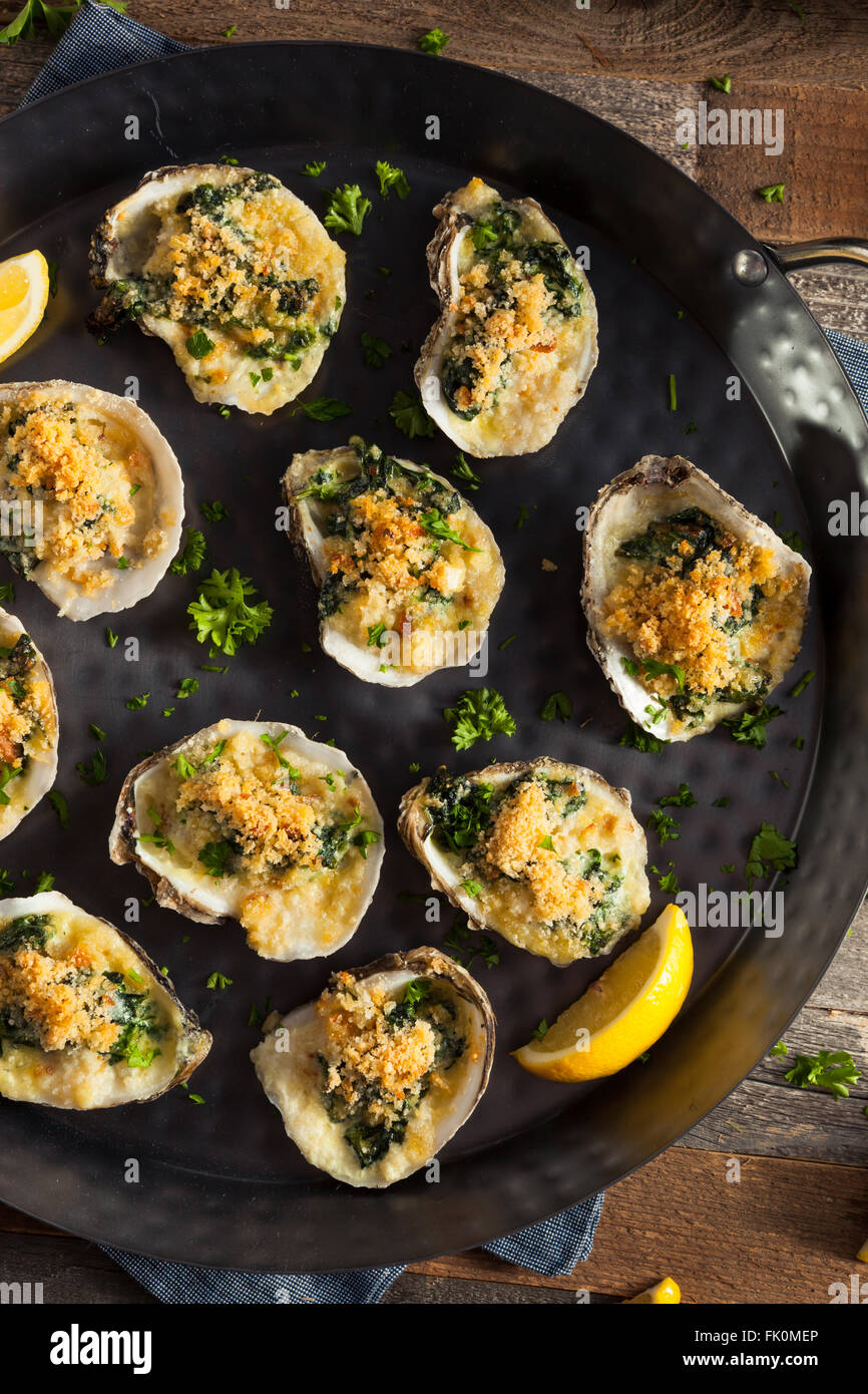 Homemade Creamy Oysters Rockefeller with Cheese and Spinach Stock Photo