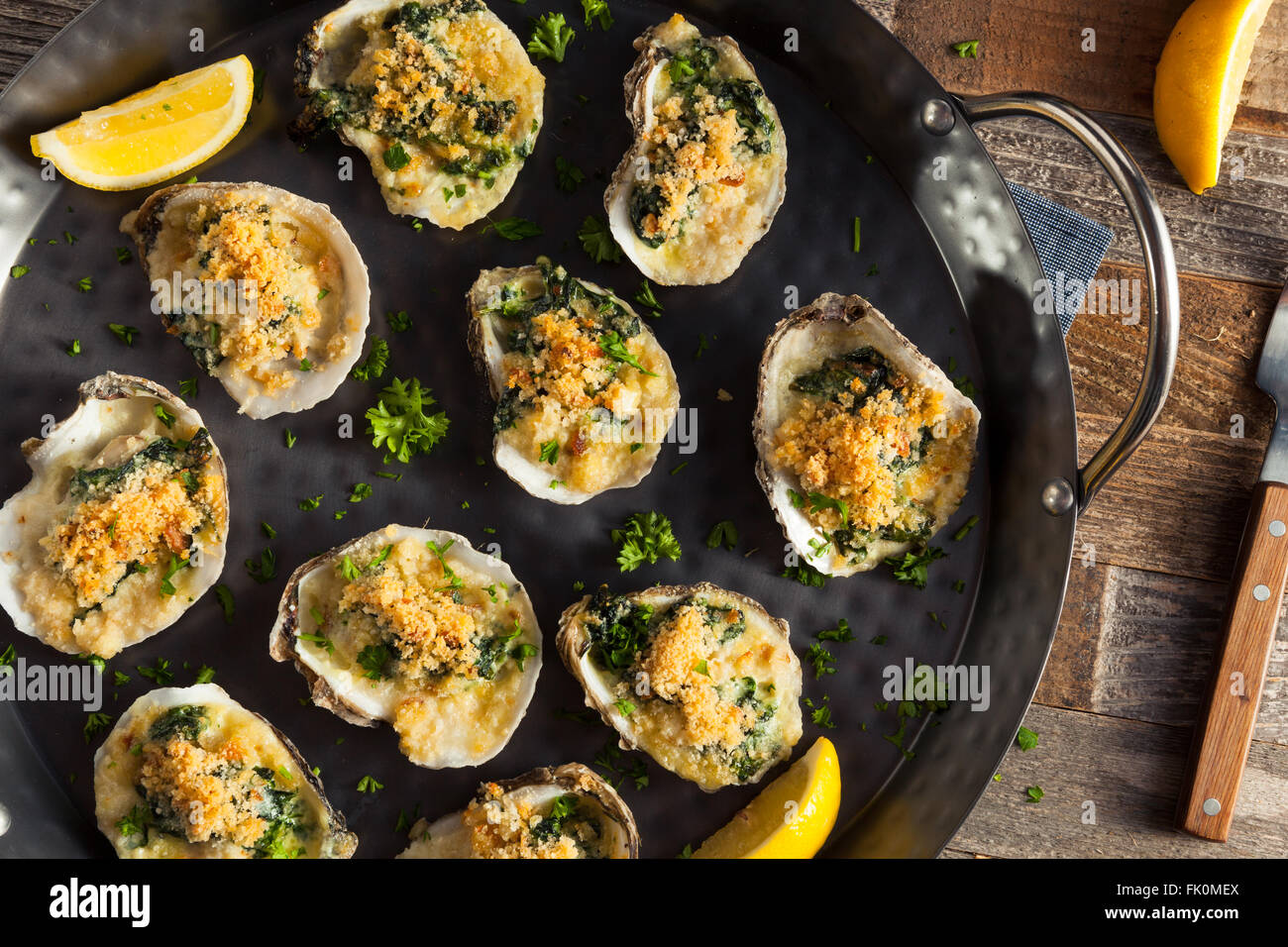 Homemade Creamy Oysters Rockefeller with Cheese and Spinach Stock Photo