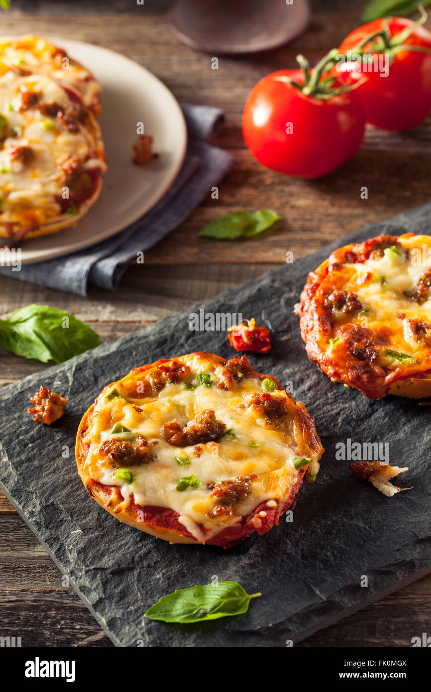 Sausage and Pepper Pizza Bagels with Cheese Stock Photo Alamy