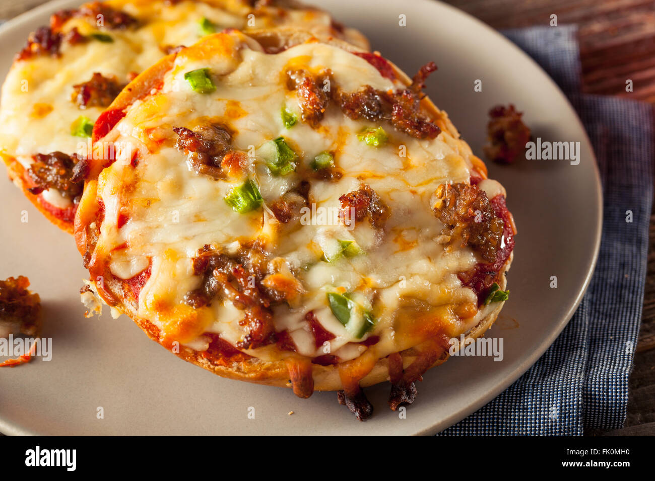Sausage and Pepper Pizza Bagels with Cheese Stock Photo Alamy