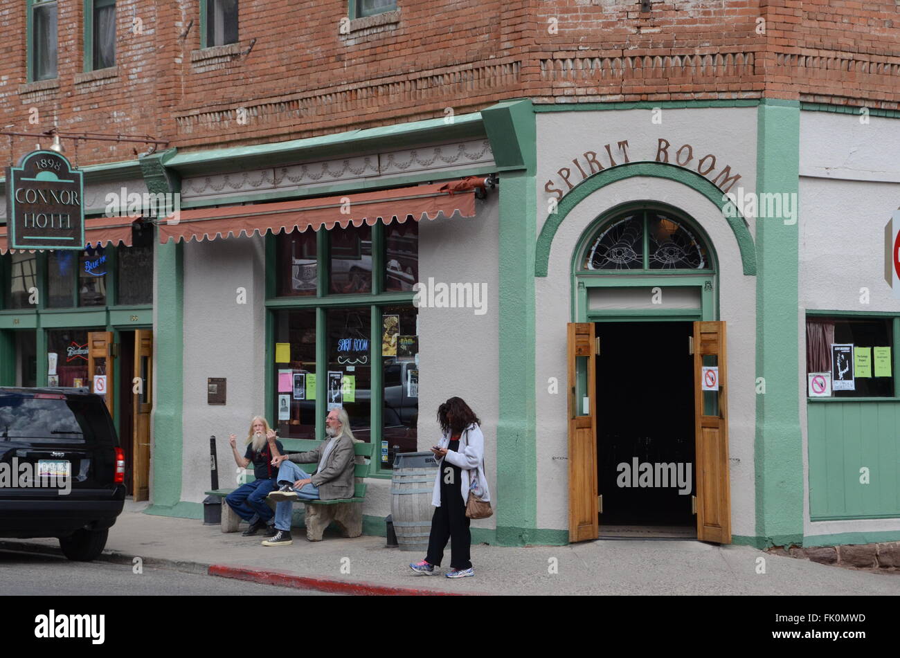 jerome ghost town arizona connor hotel ex brothel old hippies on bench outside bar Stock Photo