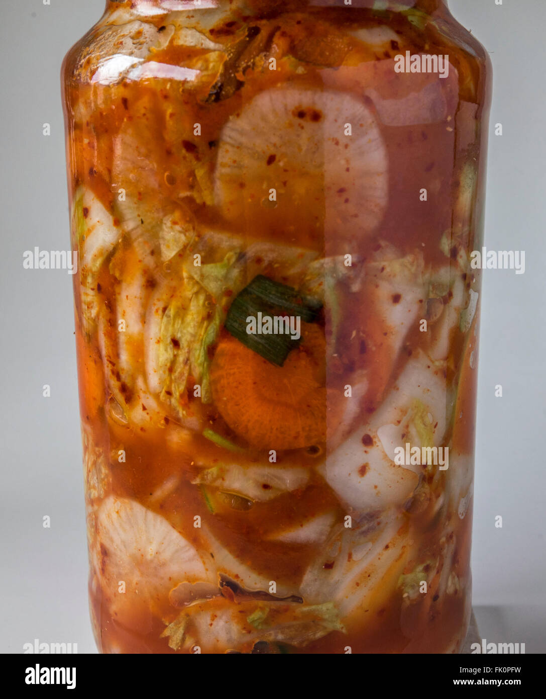 Kimchi is a traditional fermented Korean side dish made of vegetables with a variety of seasonings Stock Photo