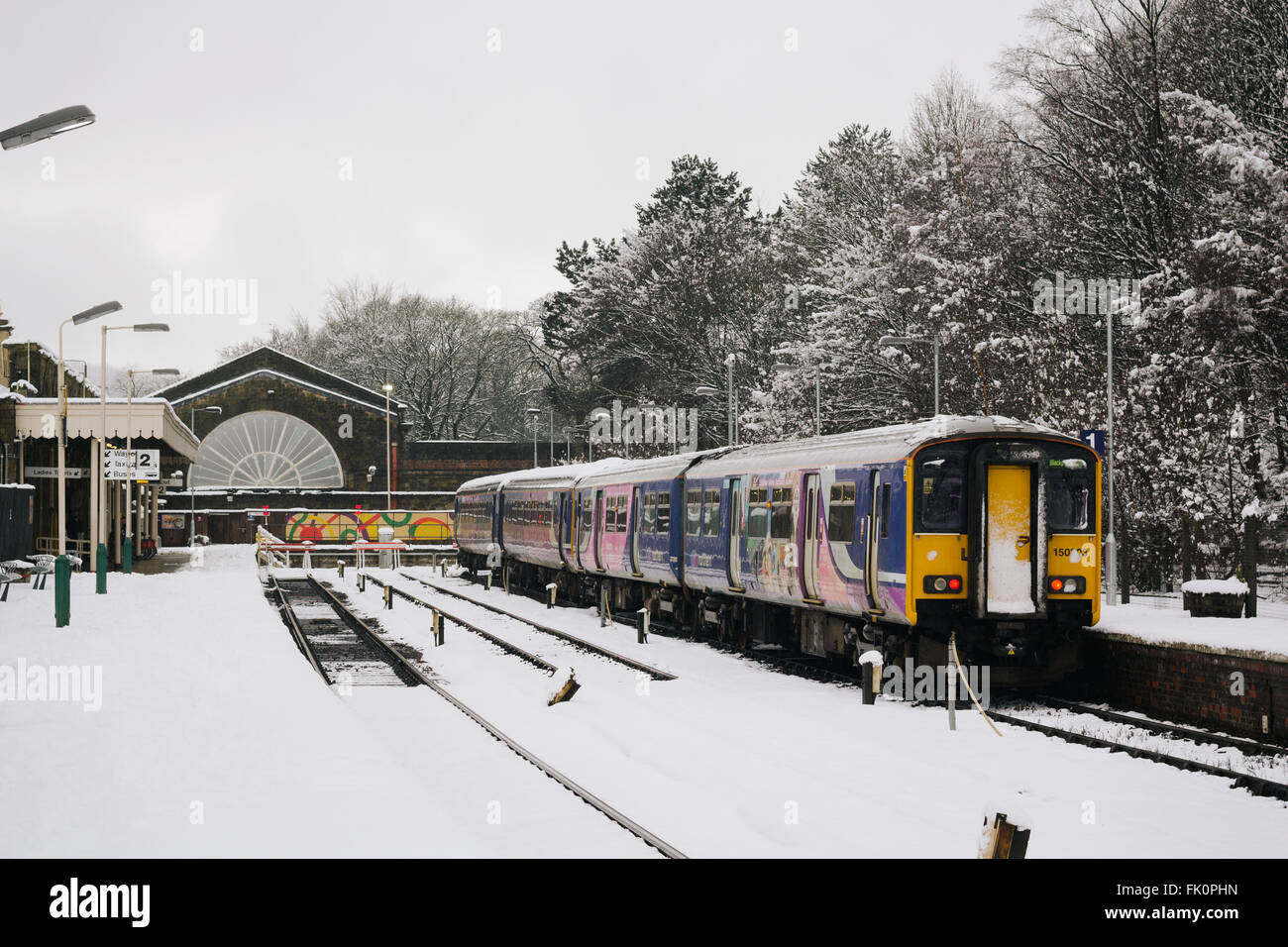 Train in Buxton station with snow. Stock Photo