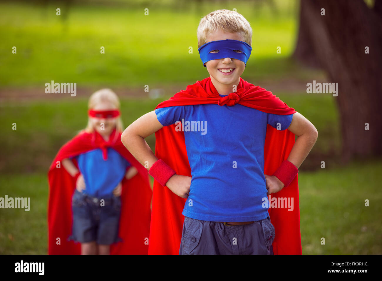 Brother and sister pretending to be superhero Stock Photo