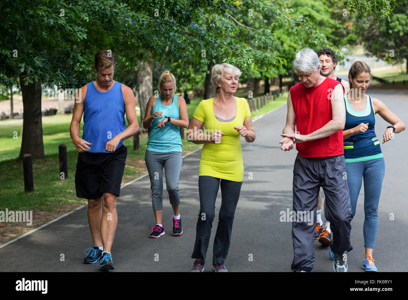 Marathon athletes taking their heart rate Stock Photo Alamy