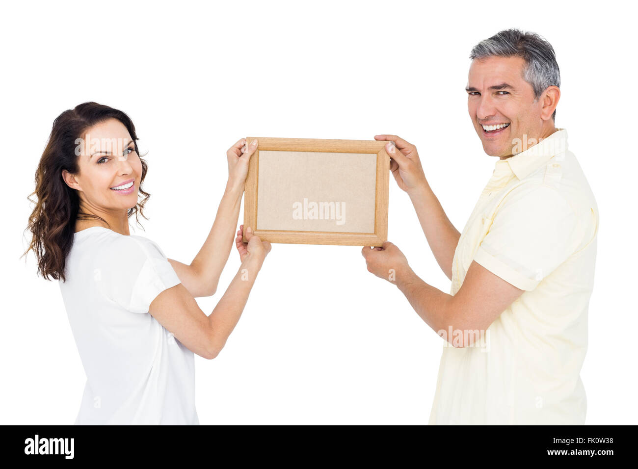 Woman holding empty picture frame hi-res stock photography and images ...