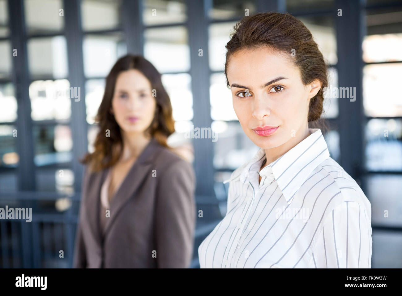 Young businesswomen in office Stock Photo - Alamy