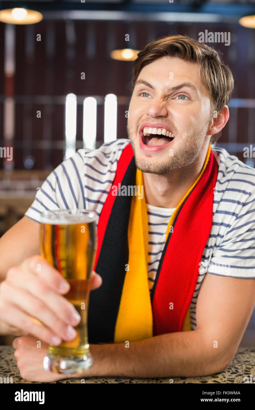Man toasting a beer Stock Photo Alamy