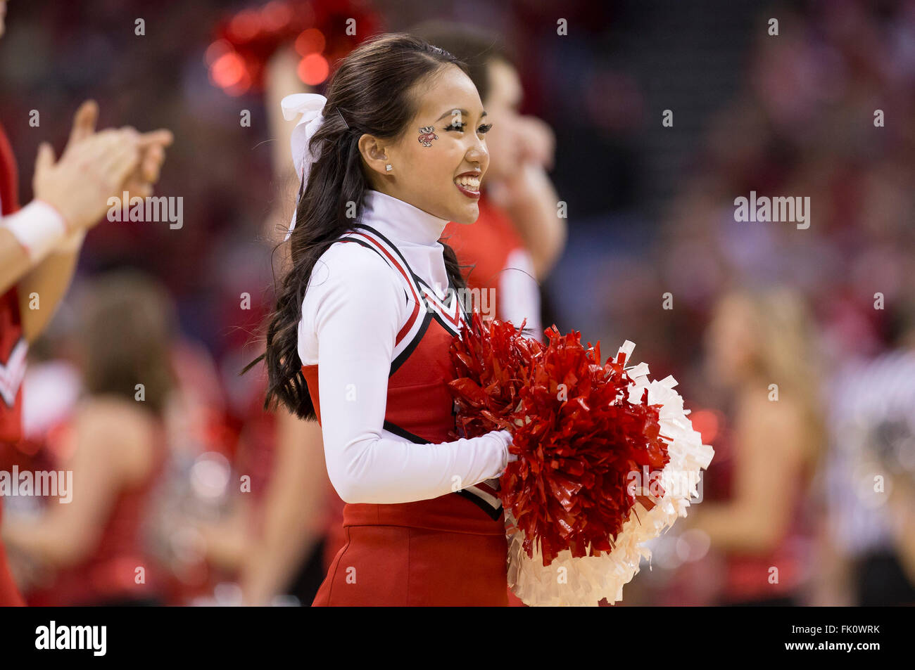 Madison, WI, USA. 28th Feb, 2016. Wisconsin Badgers cheerleaders entertain the crowd during the NCAA Basketball game between the Michigan Wolverines and the Wisconsin Badgers at the Kohl Center in Madison, WI. Wisconsin defeated Michigan 68-57. John Fisher/CSM/Alamy Live News Stock Photo