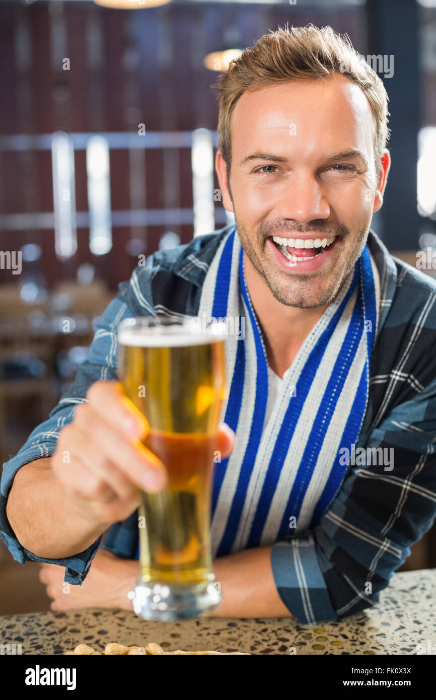 Man toasting a beer Stock Photo Alamy