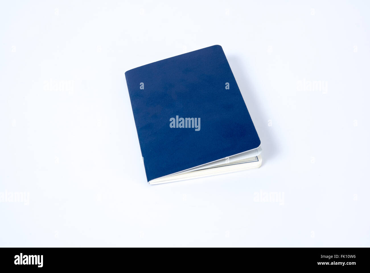 Blank blue passport on white background Stock Photo Alamy