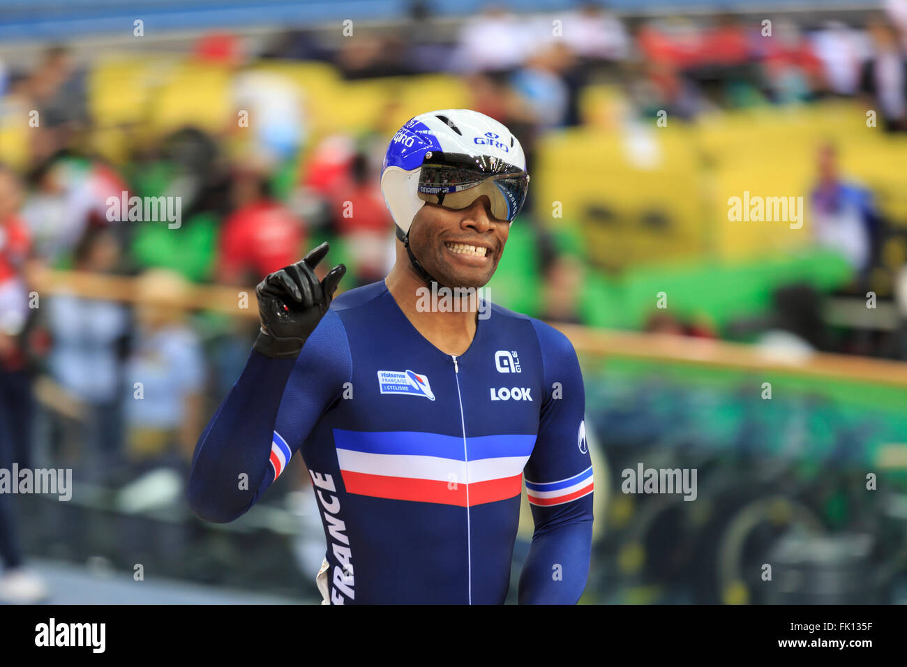 London, UK, 4 March 2016. UCI 2016 Track Cycling World Championships. Reigning Men's Individual Sprint World Champion Gregory Bauge (France) beat Canada's Hugo Barbette by 0.011s in the 1/16 finals and shows the crowd how far that margin is in real terms. Credit:  Clive Jones/Alamy Live News Stock Photo