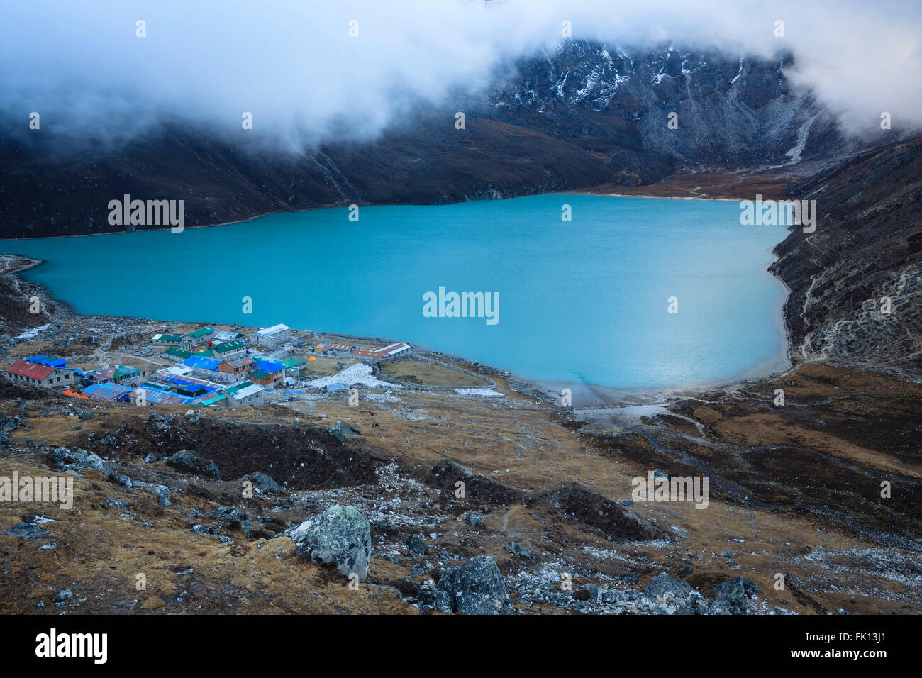 Holy lake Dudh Pokhari and Gokyo Sherpa village. Sagarmatha National Park. Solukhumbu District. Nepal. Stock Photo