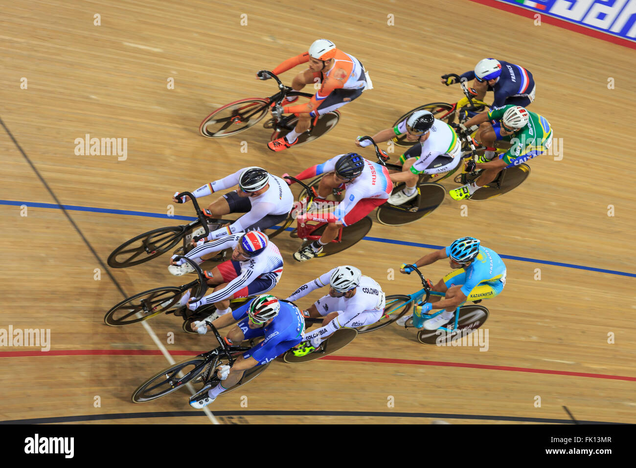 London, UK, 4 March 2016. UCI 2016 Track Cycling World Championships. Great Britain's Mark Cavendish (left, centre) competes in the third round of the Men's Omnium, the Elimination Race. He took 2nd place behind Columbia's Fernando Gaviria; and lies 6th overall after day one. Credit:  Clive Jones/Alamy Live News Stock Photo