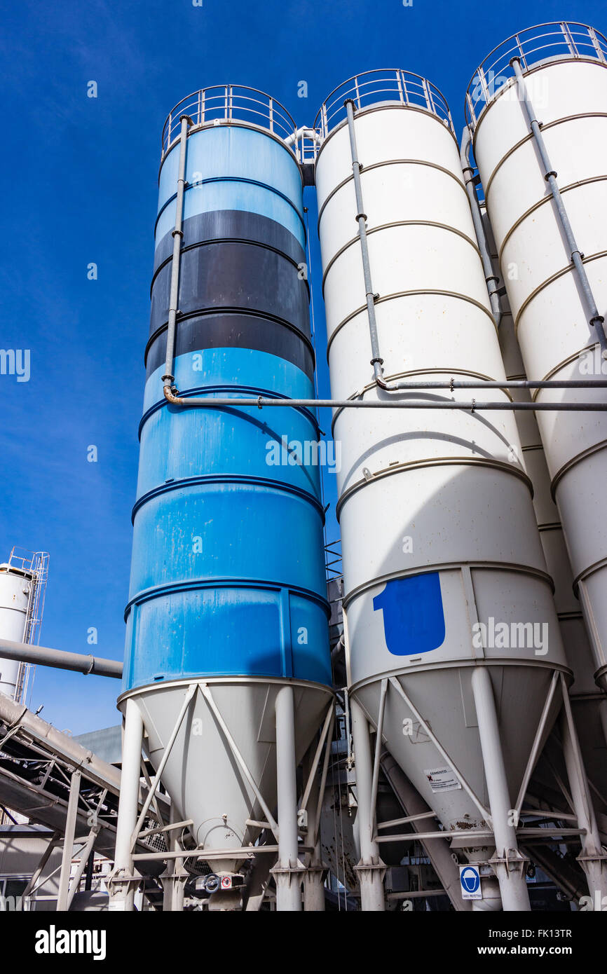 The Cement factory and related blue silos Stock Photo - Alamy
