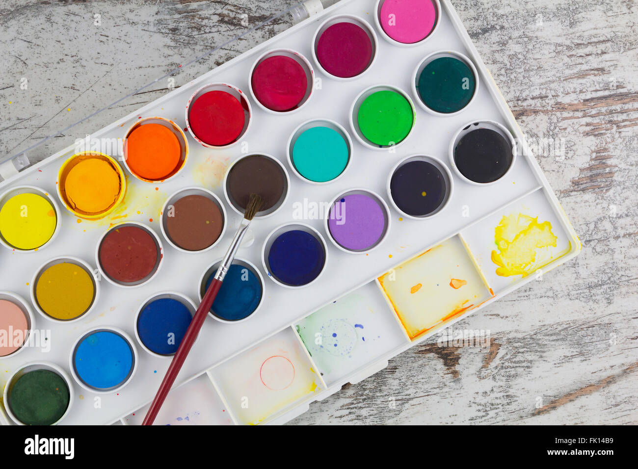 Small Watercolor Paint Palette with Brush Cut Out Stock Photo - Alamy