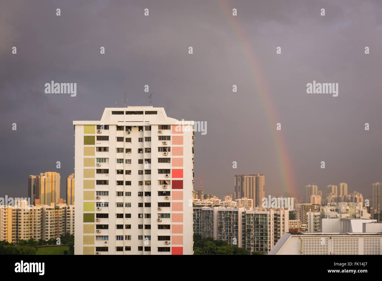 Beautiful rainbow over residential apartment after stormy weather in Singapore. Taken 11 January
