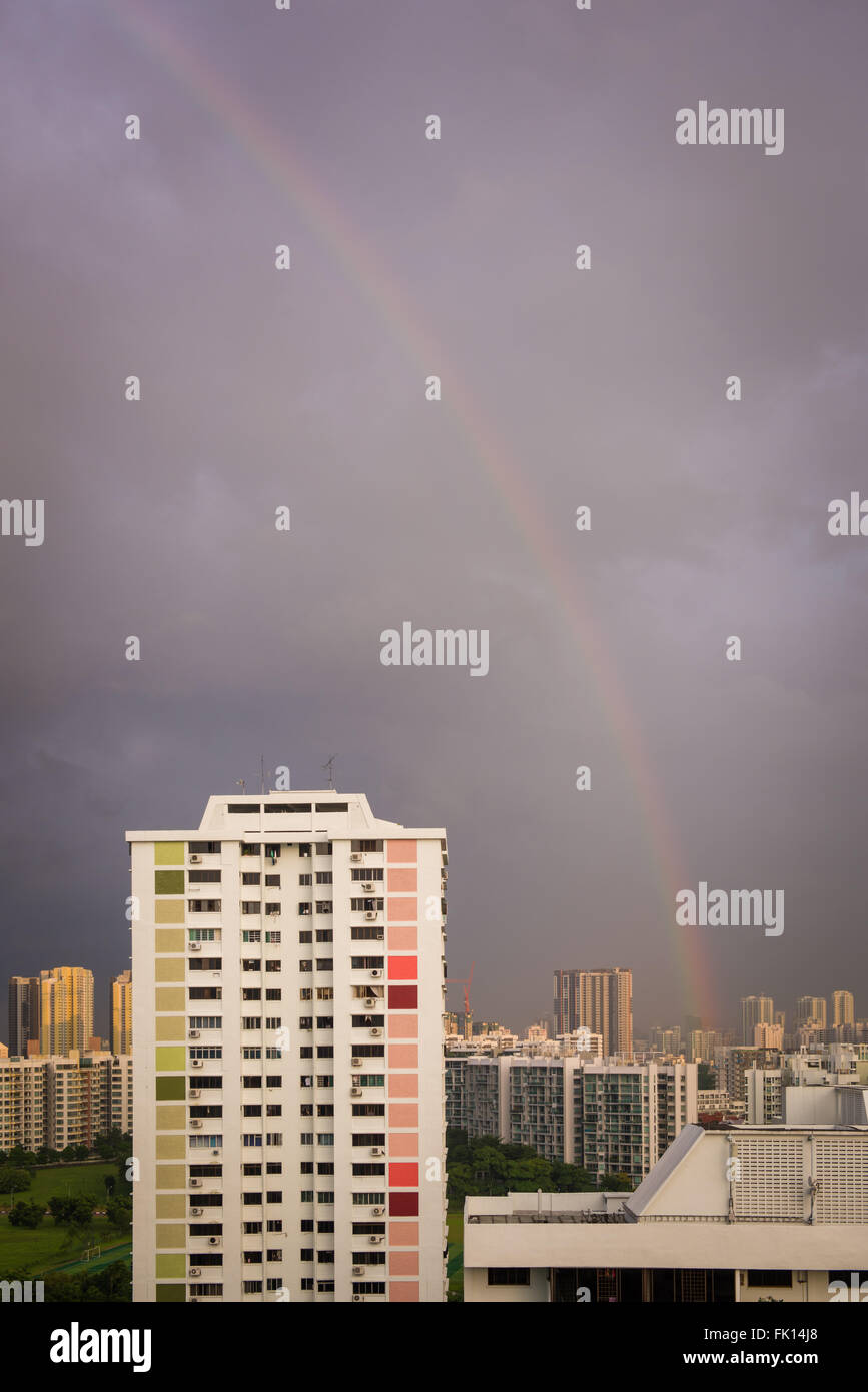 Beautiful rainbow forming over residential apartment after stormy weather in Singapore. Taken 11