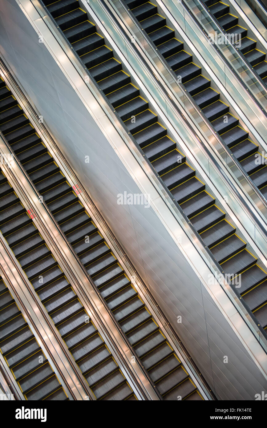 Escalators for effective and efficient transportation. Stock Photo