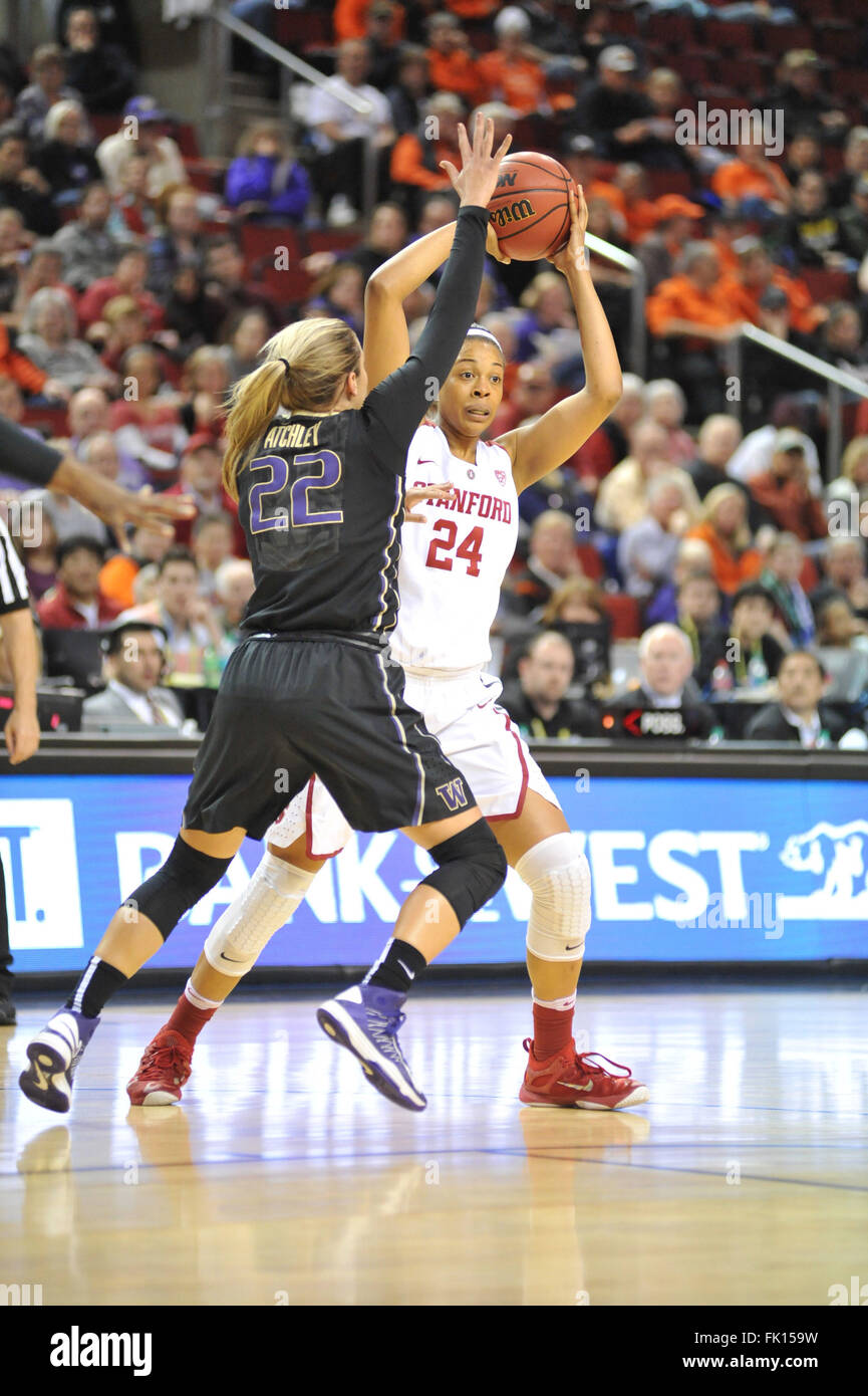 Stanford Cardinal forward Erica McCall is defended by Washington guard Alexus Atchley during this PAC12 Womens Tournament Quarterfinal game. Washington won the game 73-65 played in Key Arena, Seattle, WA. Jeff Halstead/CSM Stock Photo