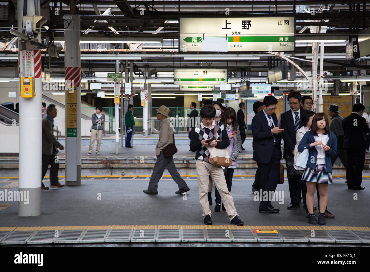 Commuters waiting for the metro at the Ueno metro station in Tokyo, Japan. Stock Photo