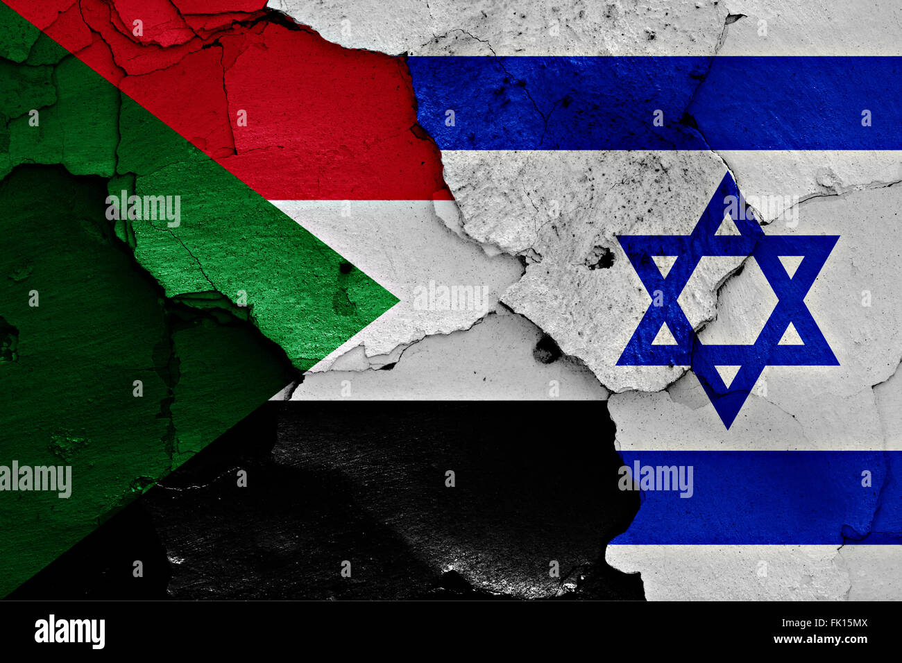 flags of Sudan and Israel painted on cracked wall Stock Photo