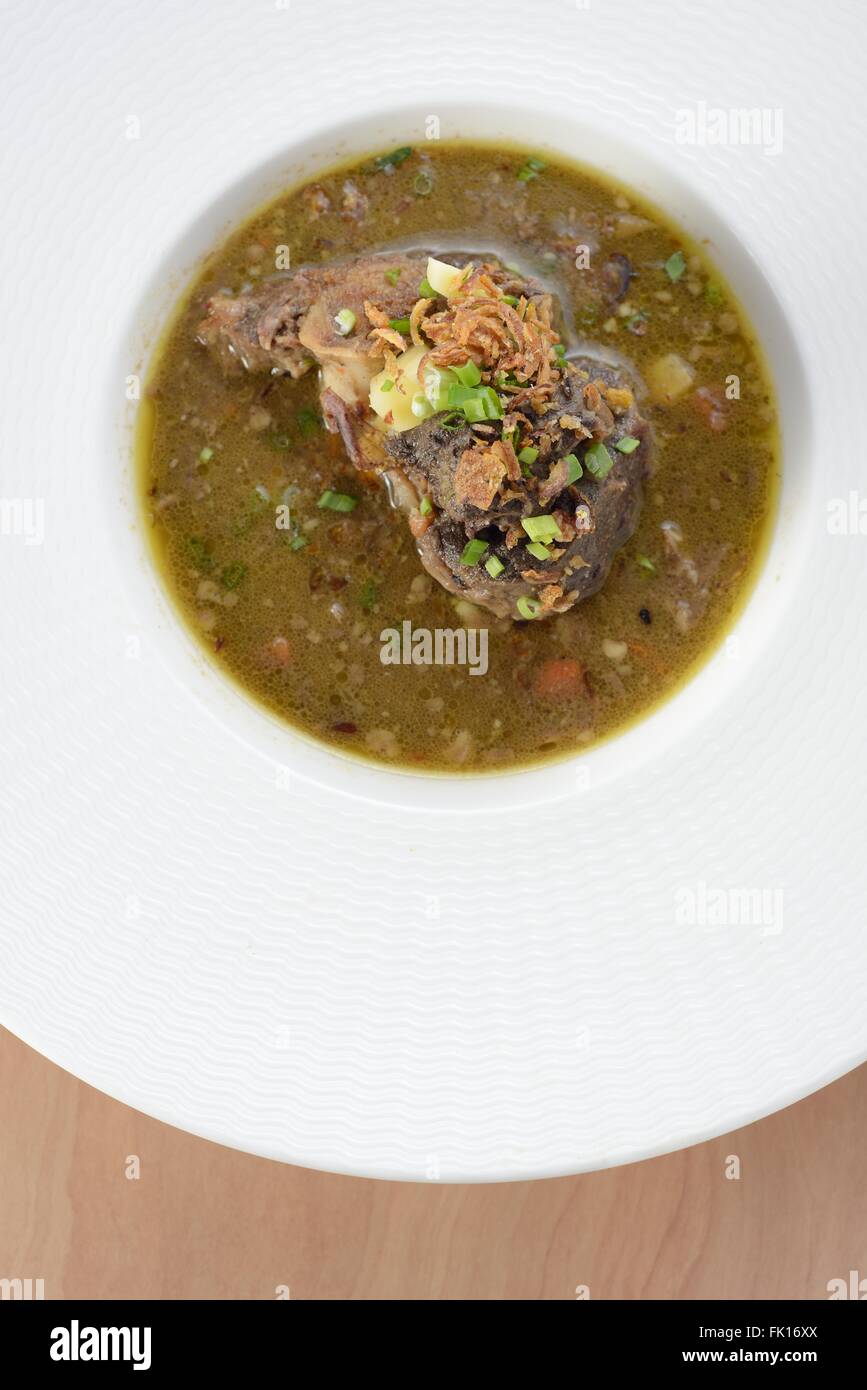 Delicious oxtail soup Isolated on White Background. Stock Photo