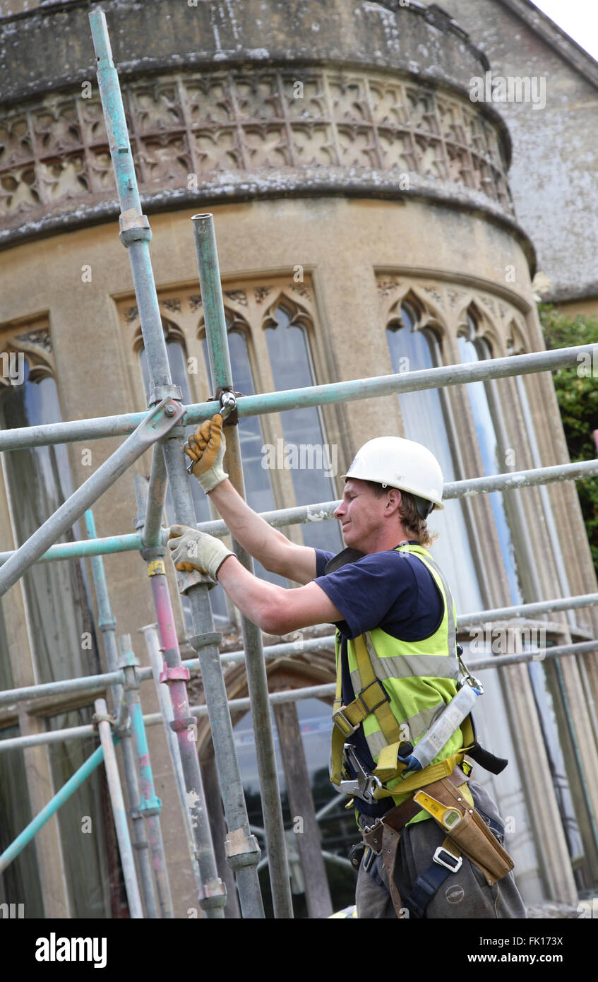 Close-up of a scaffolder working at Tyntesfield House, a National Trust owned stately home near Bristol Stock Photo