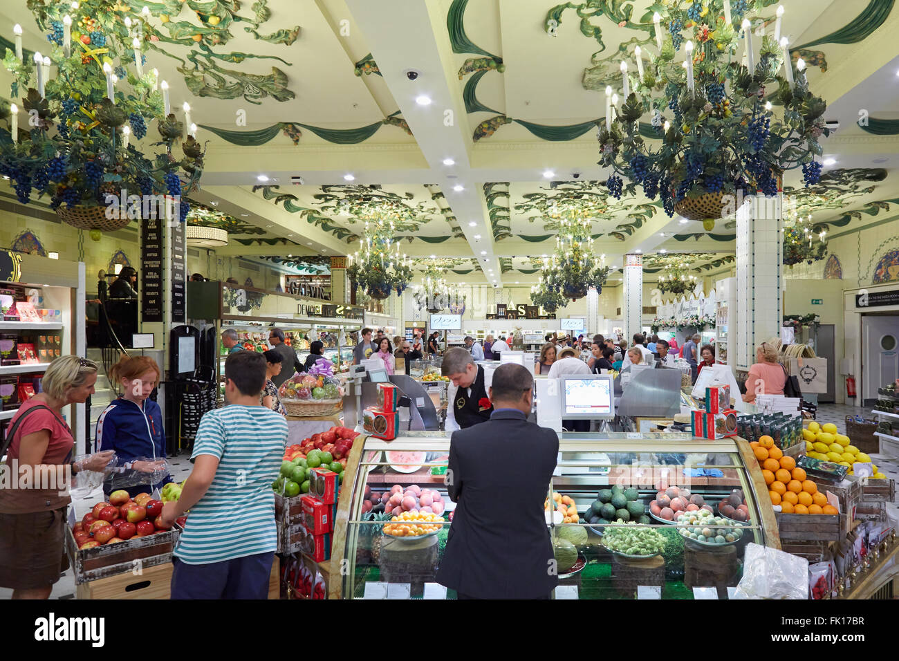 Harrods department store interior, grocery area with people in London Stock Photo