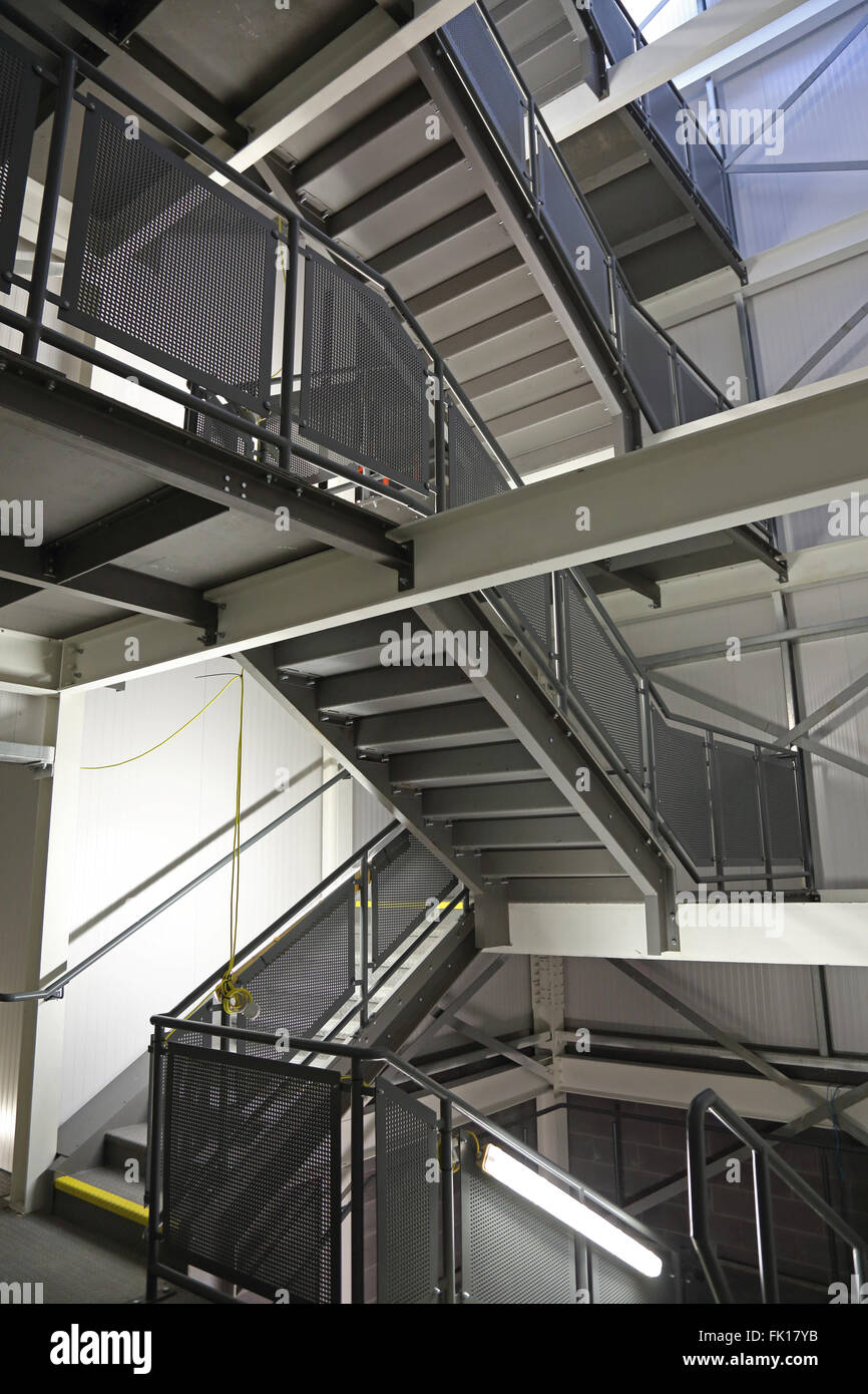 Steel escape staircase structure in a multiplex cinema complex under construction in London, UK Stock Photo