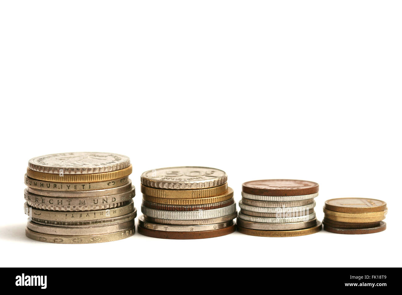 Old European coins of different currency on white background Stock