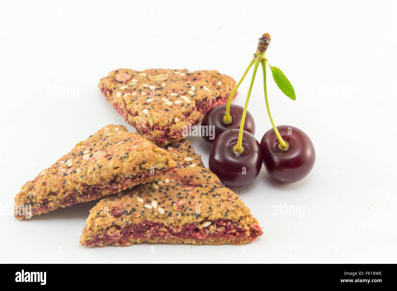 Integral biscuits with fresh cherry Stock Photo