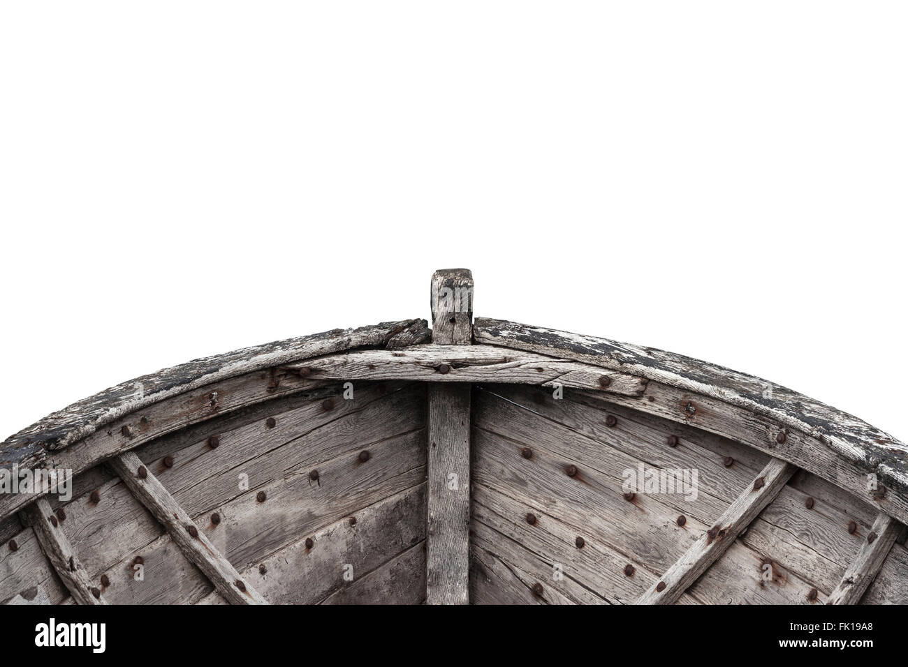 Horizontal photo of an old fishing wood boat with rusted nails isolated on white background Stock Photo