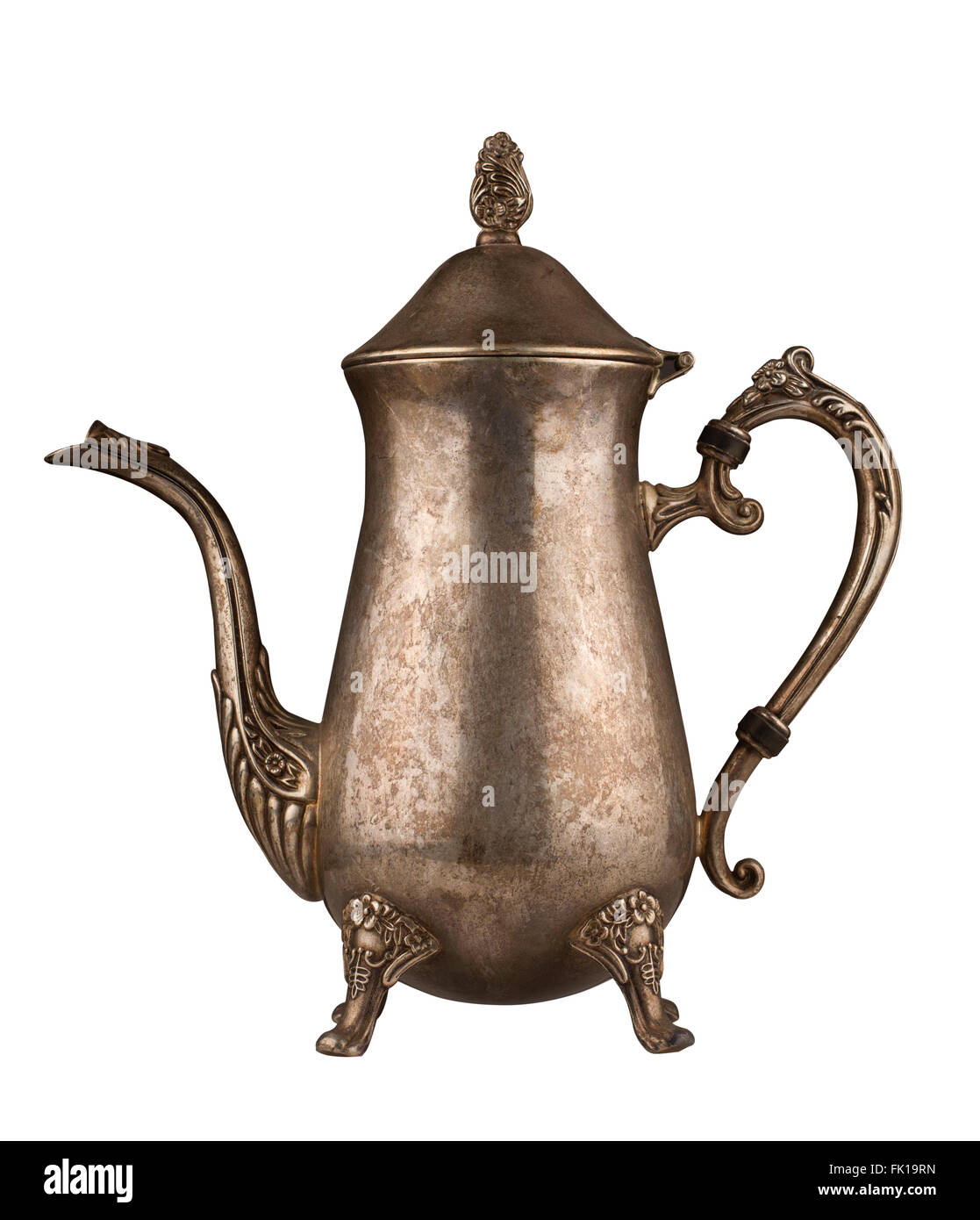 Silver vintage tea kettle with engravings isolated on white background Stock Photo