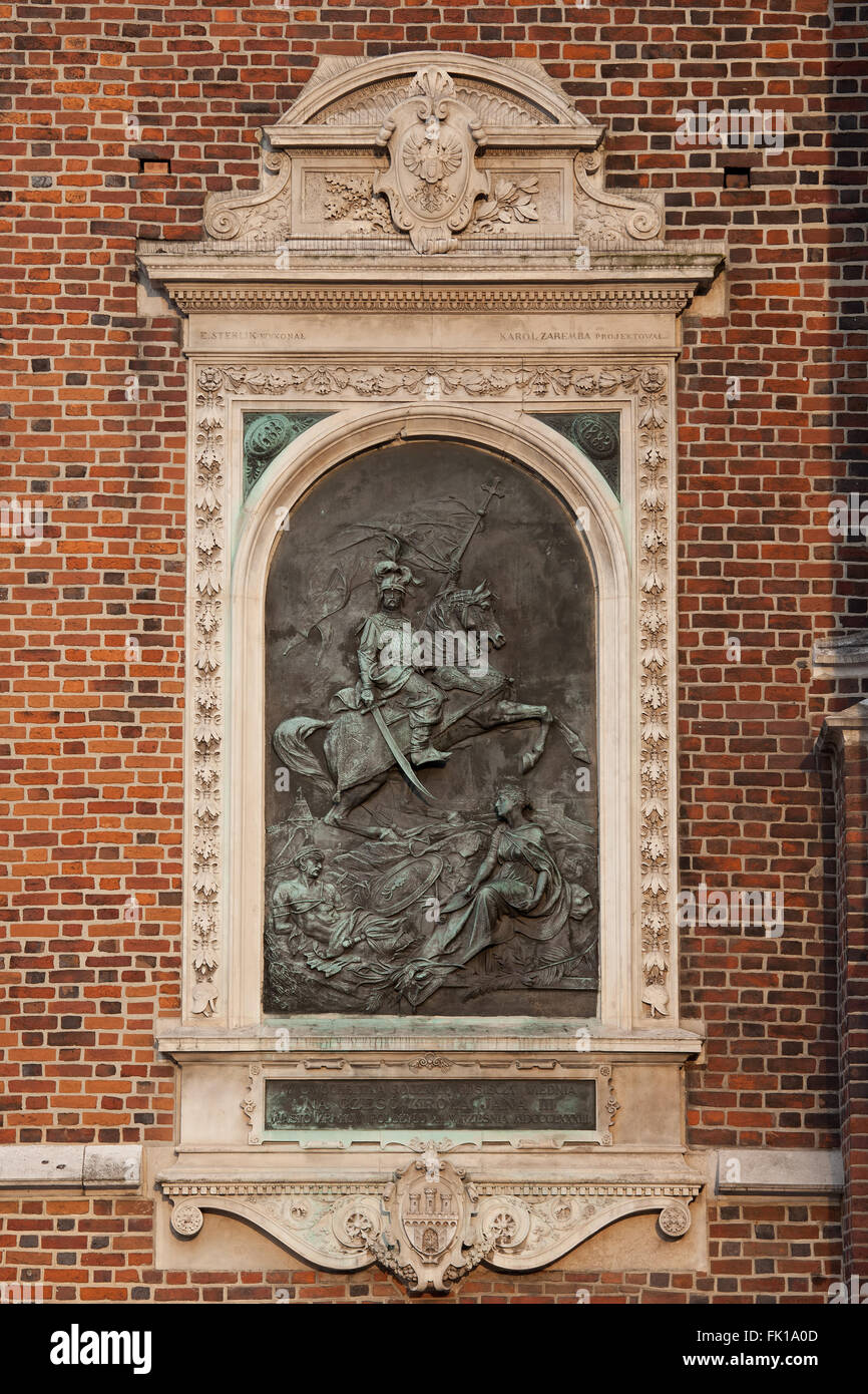 King John III Sobieski (Jan III Sobieski) bronze relief on St. Mary Basilica wall in Krakow, Poland Stock Photo