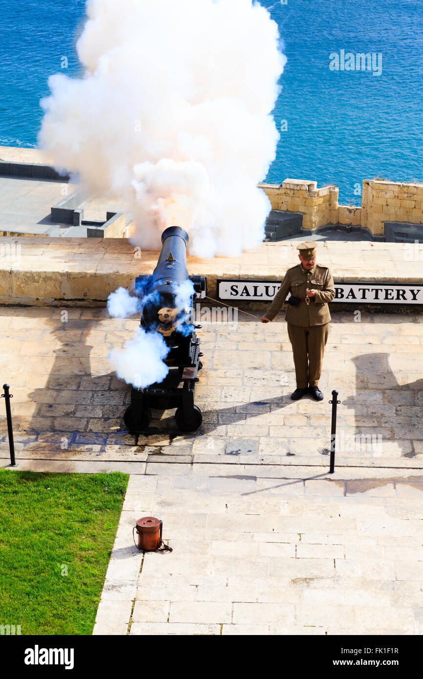 Firing the noon day canon, Saluting Battery, Upper Barrakka Gardens, Floriana,Valletta, Malta Stock Photo