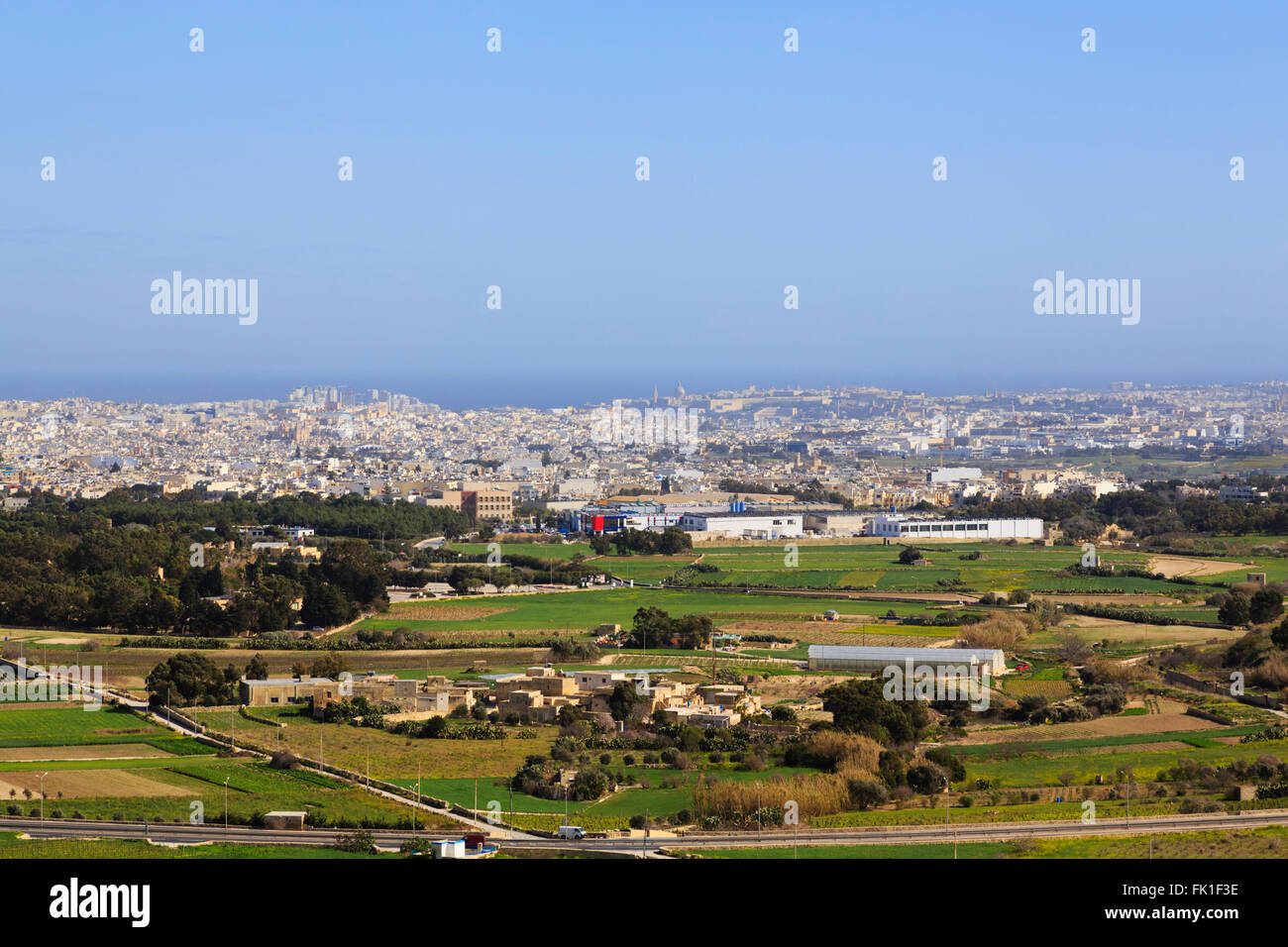 view across Valletta and Mosta from the city walls of Mdina Stock Photo