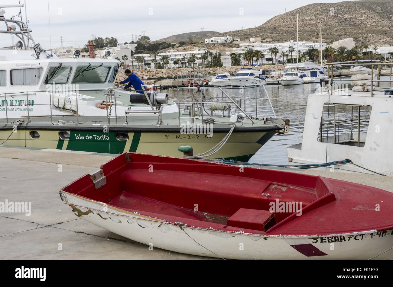 A red boat view in Carboneras port, Almería province, Spain Stock Photo