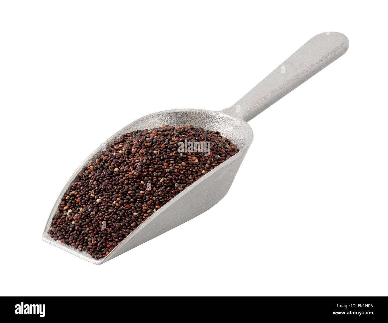 Black Quinoa in a Cast Aluminum Scoop. The image is a cut out, isolated on a white background. Stock Photo