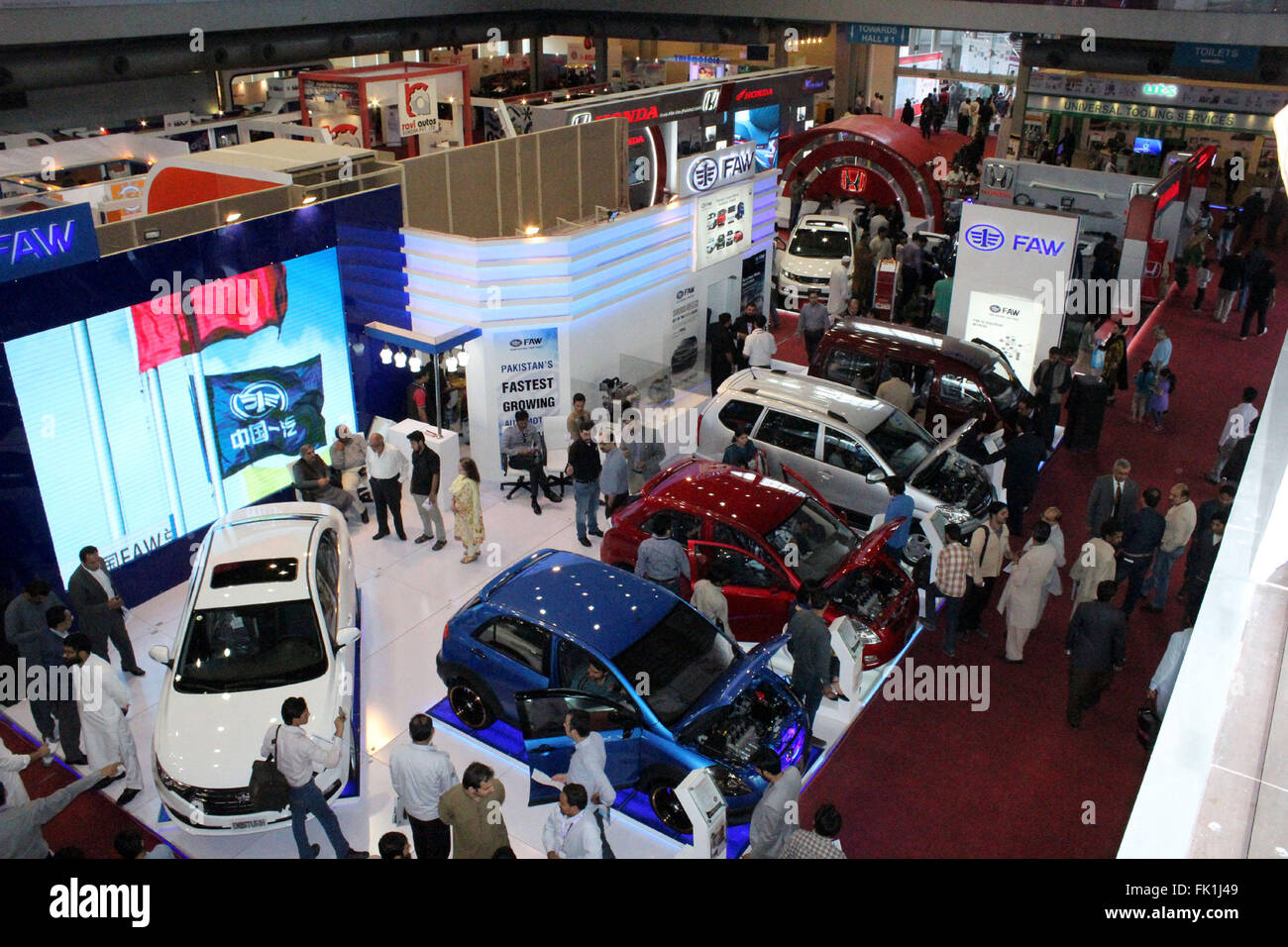 (160305) -- LAHORE, March 5, 2016 (Xinhua) -- People visit at FAW booth at the Pakistan Auto Show 2016 at expo center in eastern Pakistan's Lahore on March 5, 2016. The three-day Pakistan Auto Show 2016 was kicked off at Lahore Expo on Friday, attracted over 135 local and foreign auto-manufacturers. (Xinhua/Jamil Ahmed) Stock Photo