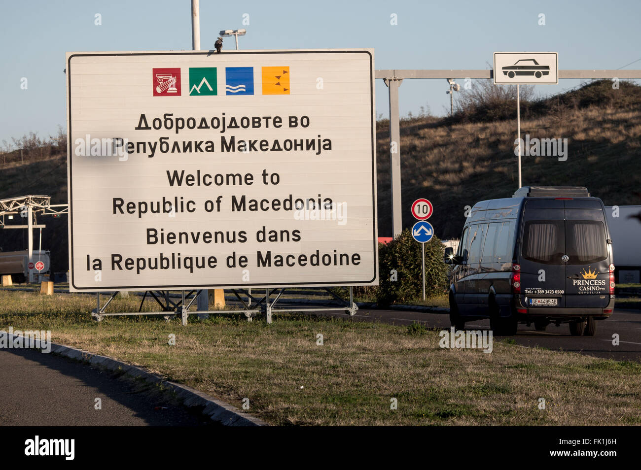 A sign written with Welcome to Republic of Macedonia' can be seen on the border in Gevgelija near Idomeni, Greece, 05 March 2016. Only a few refugees from Syria and Iraq are crossing the border into Macedonia, most have to sit tight in Camp Idomeni. Photo: Michael Kappeler/dpa Stock Photo