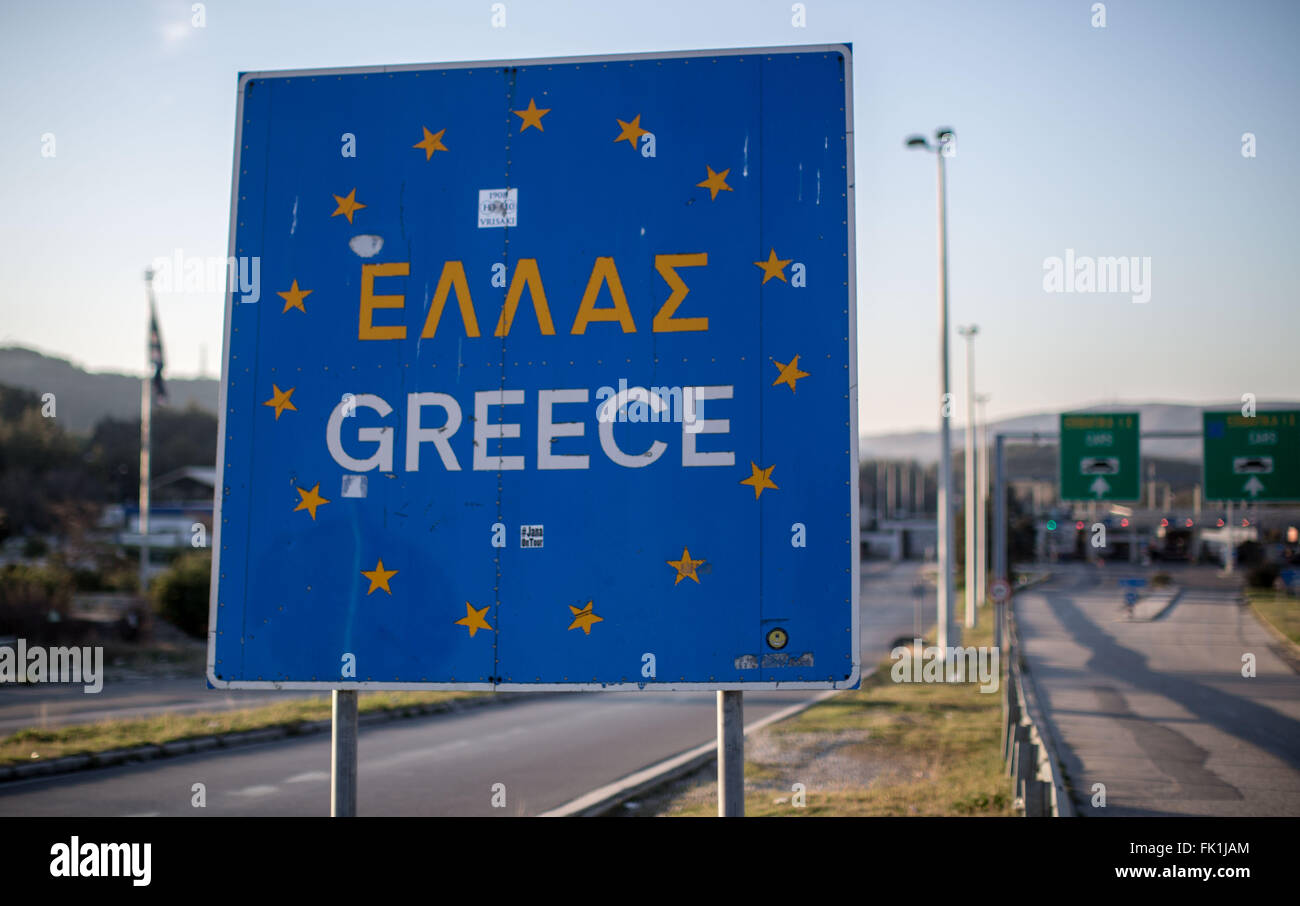 A sign announces the Greek border near Idomeni, Greece, 05 March 2016. Only a few refugees from Syria and Iraq are crossing the border into Macedonia, most have to sit tight in Camp Idomeni. Photo: Michael Kappeler/dpa Stock Photo